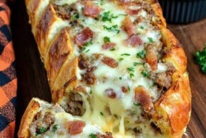 Thumbnail for Cheesy Sausage Bacon Stuffed Bread